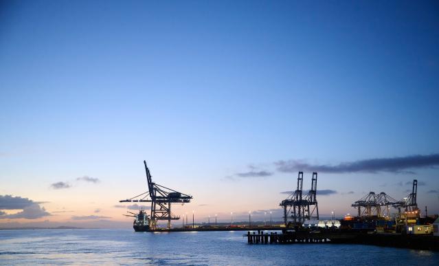 Port of Auckland cranes in the distance at dawn